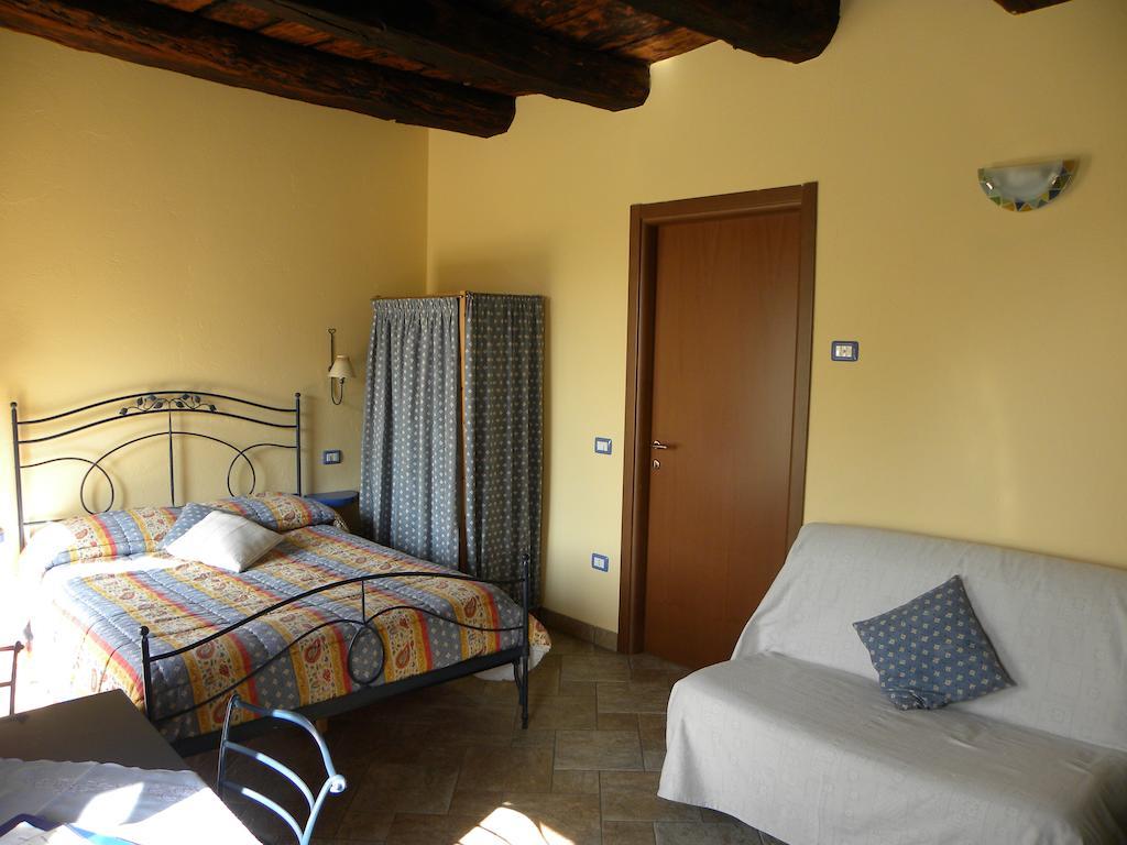 Agriturismo Fano'S Farm Suno Rum bild